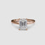 Rose gold solitaire ring with a emerald cut diamond