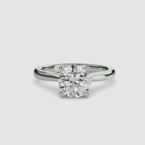 360-rotation-view-the Solvane round brilliant cut diamond classic solitaire engagement ring in white gold