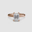 360-degree rotation view the Sylvene emerald cut diamond double prong solitaire engagement ring in rose gold