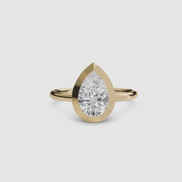 Pear-shaped bezel diamond ring solitaire gold setting