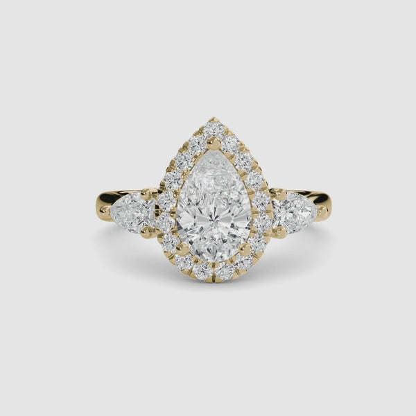 Three stone halo pave pear shaped diamond engagement ring yellow gold 