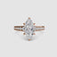 Diamond ring with a marquise-shaped center stone on a white background