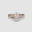 Rose gold ring with a pear-shaped diamond and twisted pave shank on a white background