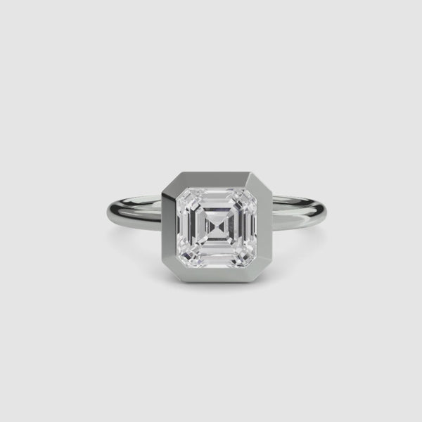 360-degree rotation view of The Lucen asscher cut diamond bezel engagement ring in white gold showing all angles