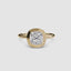 Cushion cur bezel set ring in yellow gold solitaire setting