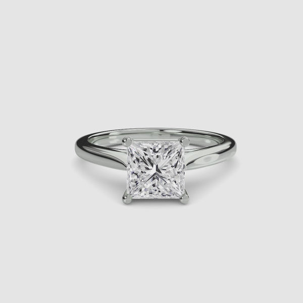 Solitaire diamond ring with a square princess-cut gemstone white gold 