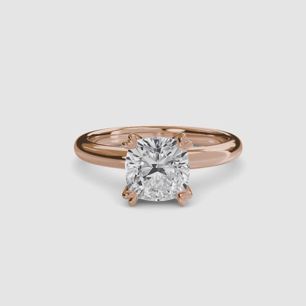 360-degree rotation view the Seris cushion cut diamond double prong solitaire engagement ring in rose gold