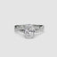 White gold ring with a oval center diamond and twisted pave shank on a white background