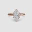Rose gold solitaire ring with a marquise-shaped diamond 