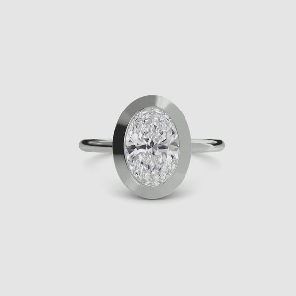 Oval bezel diamond ring solitaire white gold setting