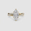 Gold ring with a marquise-shaped diamond twisted pave band on a white background