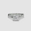 White gold ring with a large princess-cut diamond and smaller diamonds on the twisted u-pave band against a white background