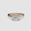 Solitaire rose gold ring with a cushion-cut diamond on a white background