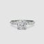 Round diamond ring with side stones white gold a white background