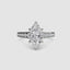 Diamond ring with a marquise-shaped center stone on a white background