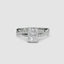 White gold ring with a radiant cut diamond twisted pave shank on a white background