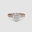 Heart-shaped diamond ring with rose gold round diamonds pave band on a white background