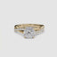 Gold ring with a large cushion-cut diamond and smaller diamonds on the twisted band against a white background