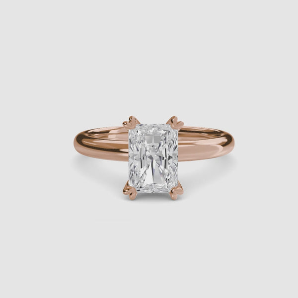 360-degree rotation the Aurien radiant cut diamond double prong solitaire engagement ring in rose gold