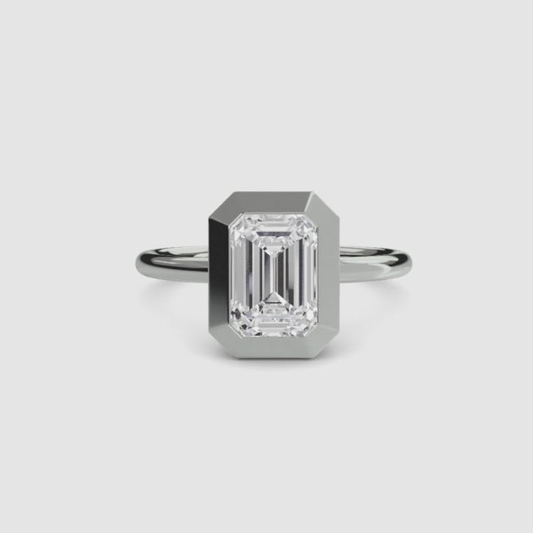 Emerald bezel diamond ring white gold solitaire setting