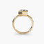 Solitaire gold ring with a princess-cut diamond bezel set