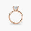 Side view of The Elowen showing princess cut diamond secured with double prong corner protection solitaire setting rose gold