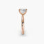 Profile view of The Elowen showing princess cut diamond secured with double prong corner protection rose gold solitaire setting