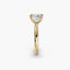 Profile view of The Elowen showing princess cut diamond secured with double prong corner protection yellow gold solitaire setting
