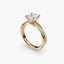 Gold ring with a princess-cut diamond and twisted pave shank on a white background