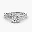 White gold ring with a large princess-cut diamond and smaller diamonds on the twisted u-pave band against a white background