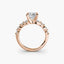 Rose gold ring with a diamond on a white background