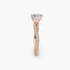 Rose gold diamond ring on a white background