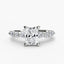 White gold ring with a central radiant cut diamond and marquise and round side stones on the band on a white background