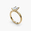 Side view of The Aurien showing radiant cut diamond with corner protection in double yellow gold prong setting