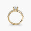 Gold ring with a diamond on a white background