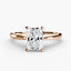 Rose gold solitaire ring with a radiant cut diamond