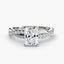 White gold ring with a radiant cut diamond twisted pave shank on a white background