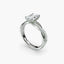 Diamond ring with a heart-shaped center stone on a white background