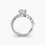 Diamond ring with a radiant cut center stone on a white background