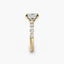 Gold ring with a diamond on a white background