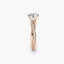 Rose gold diamond ring on a white background
