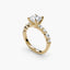Gold ring with a diamond on a white background
