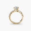 Gold ring with a diamond on a white background