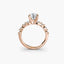 Rose gold ring with a diamond on a white background