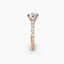 Rose gold ring with a diamond on a white background