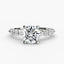 Round diamond ring with side stones white gold a white background