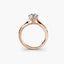 Side view of The Solvane showing traditional four-prong rose gold solitaire setting with round diamond
