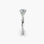 Profile view of The Solvane showing traditional four-prong white gold solitaire setting with round diamond
