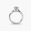 Side view of The Solvane showing traditional four-prong white gold solitaire setting with round diamond