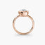 Rose gold solitaire ring with a bezel diamond set